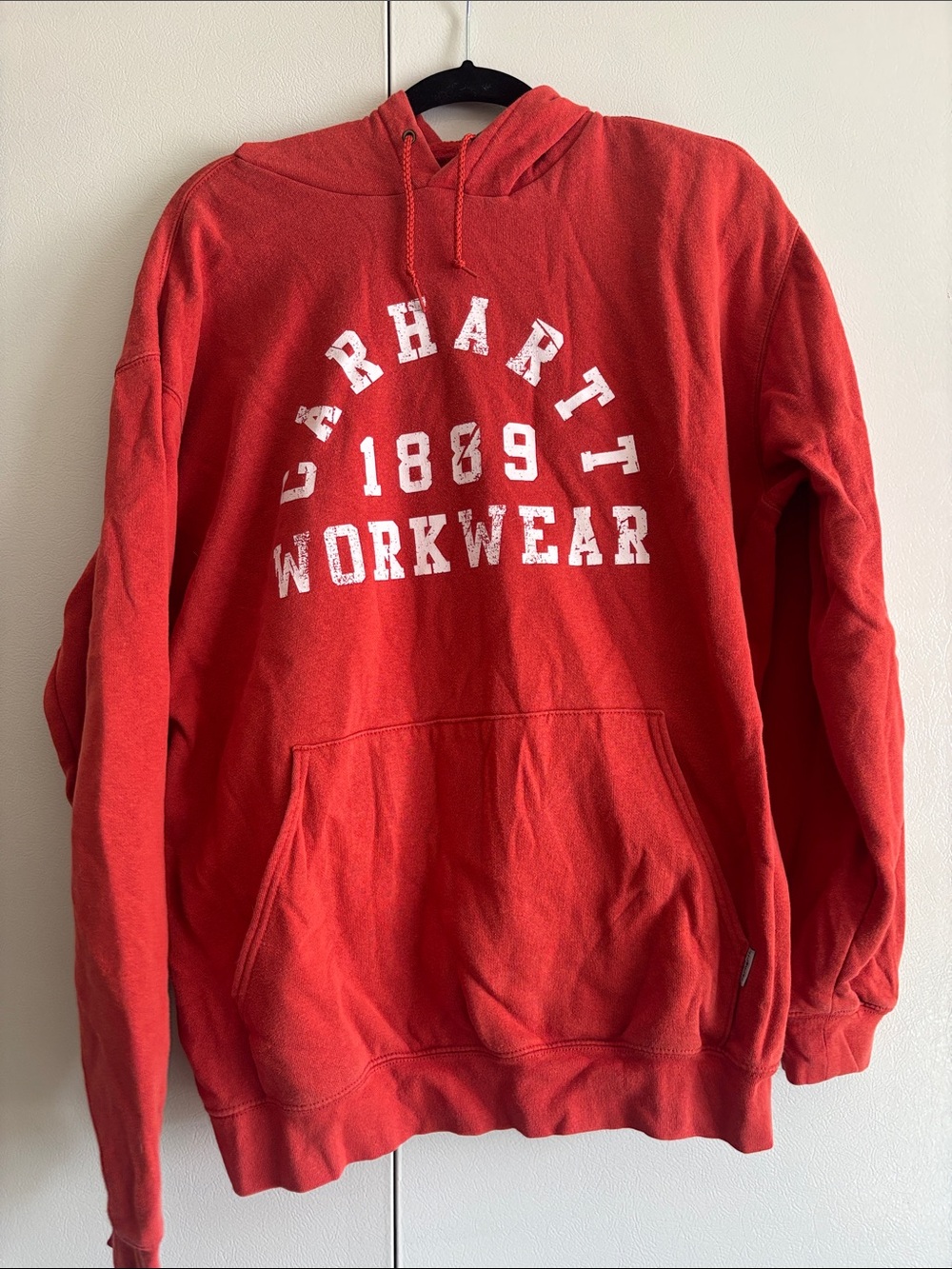 Carhartt Burnt Orange Crewneck Pullover Hoodie with White Workwear Print